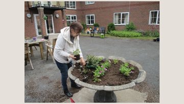Burton-Upon-Trent care home Resident enjoys new gardening hobby